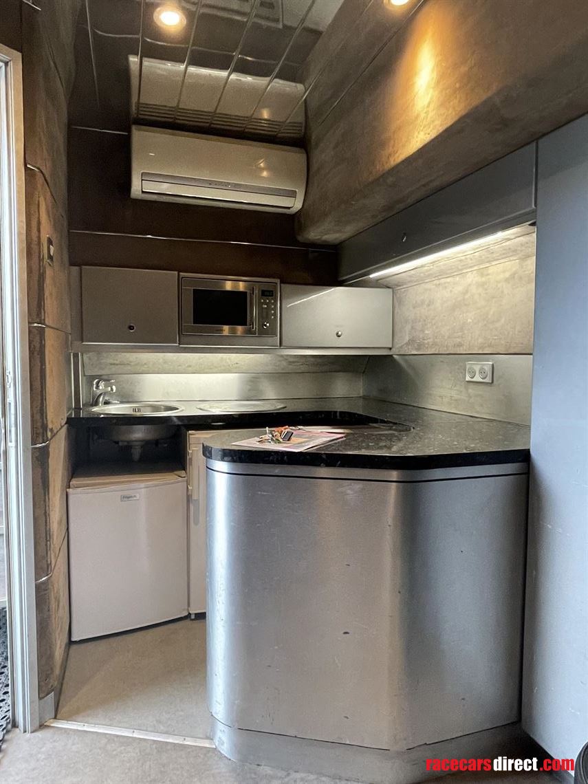 1-car-transporter-or-hospitality-unit