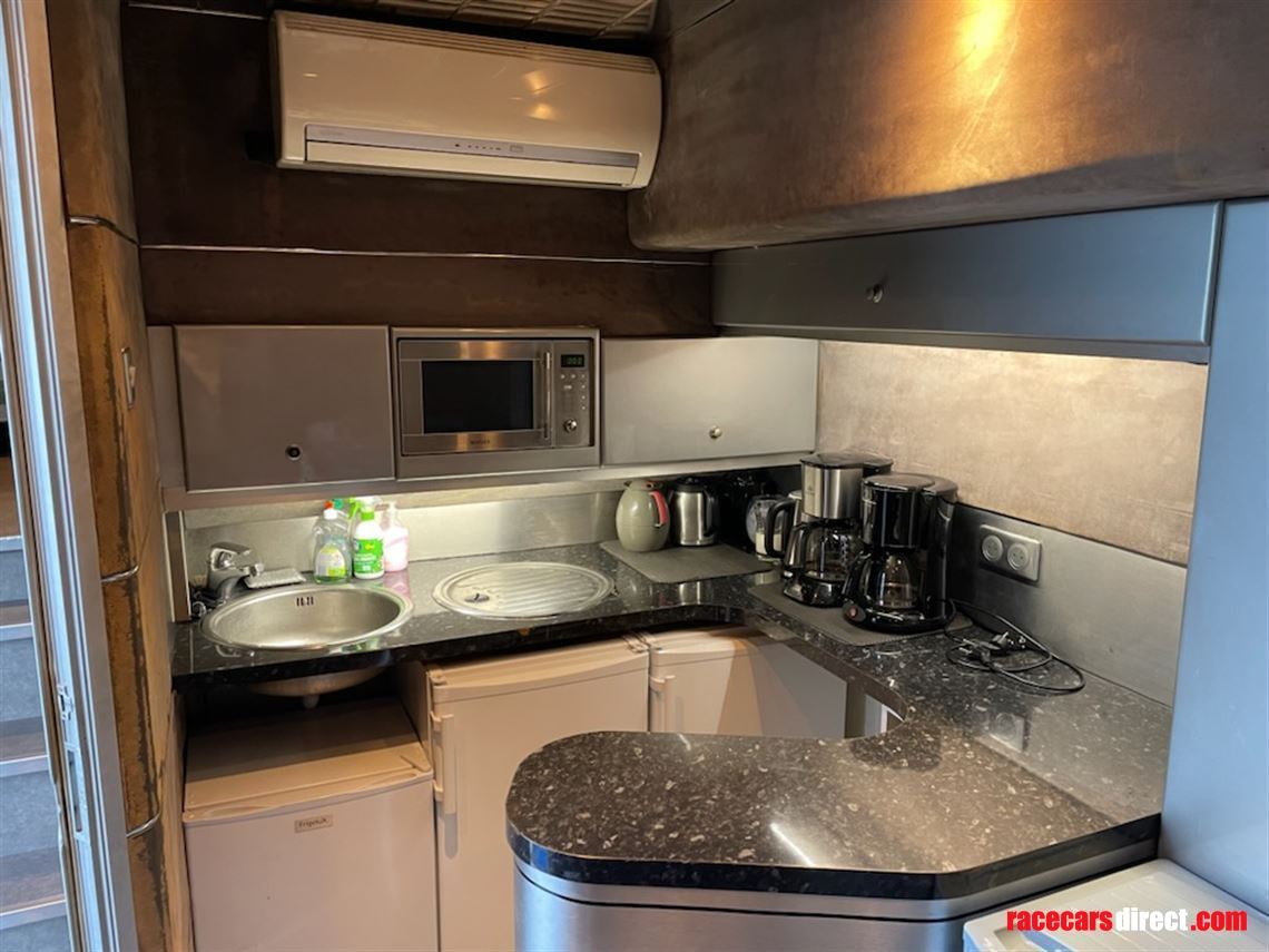 1-car-transporter-or-hospitality-unit