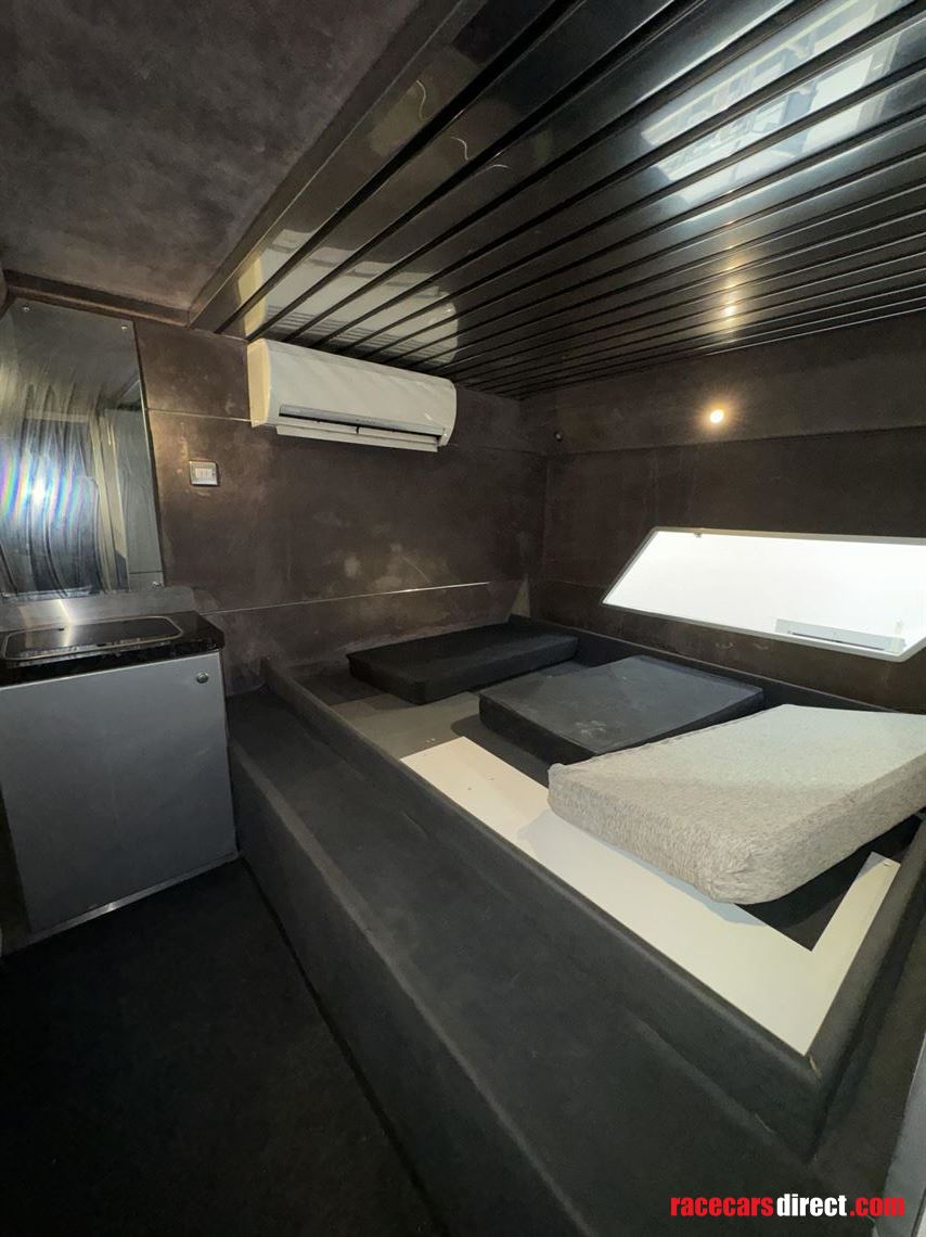 1-car-transporter-or-hospitality-unit