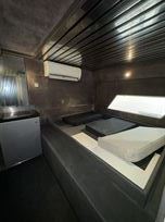 1-car-transporter-or-hospitality-unit