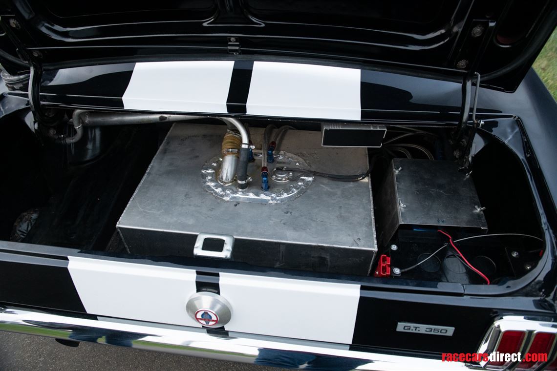 ford-mustang-fastback-1964-peking-paris-entra