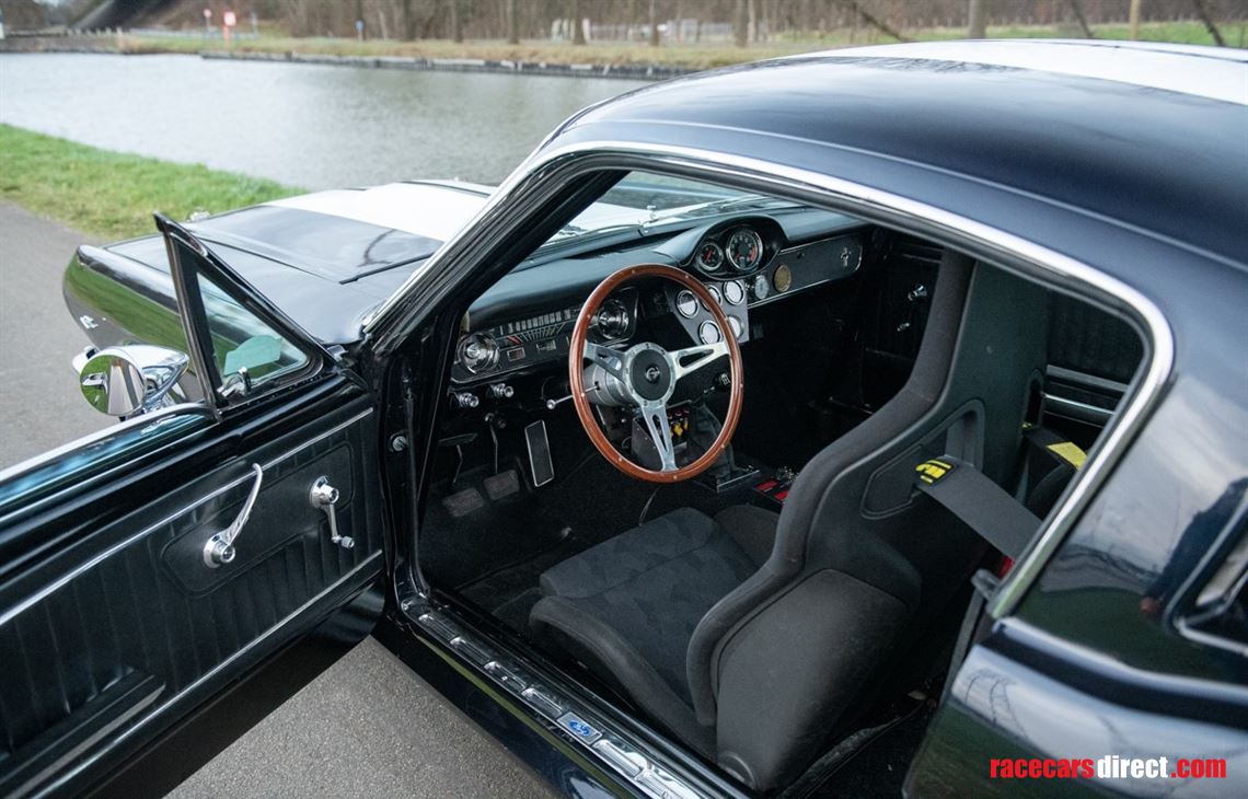 ford-mustang-fastback-1964-peking-paris-entra
