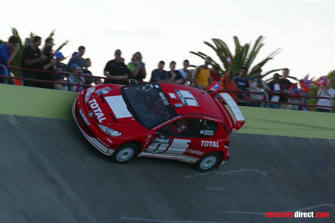 Peugeot 206 WRC - TAP Rallye de Portugal 2001 - Papadimitriou - Patterson - IXO Peugeot 206 WRC - TAP Rallye de Portugal 2001 - Papadimitriou - Patterson - IXO