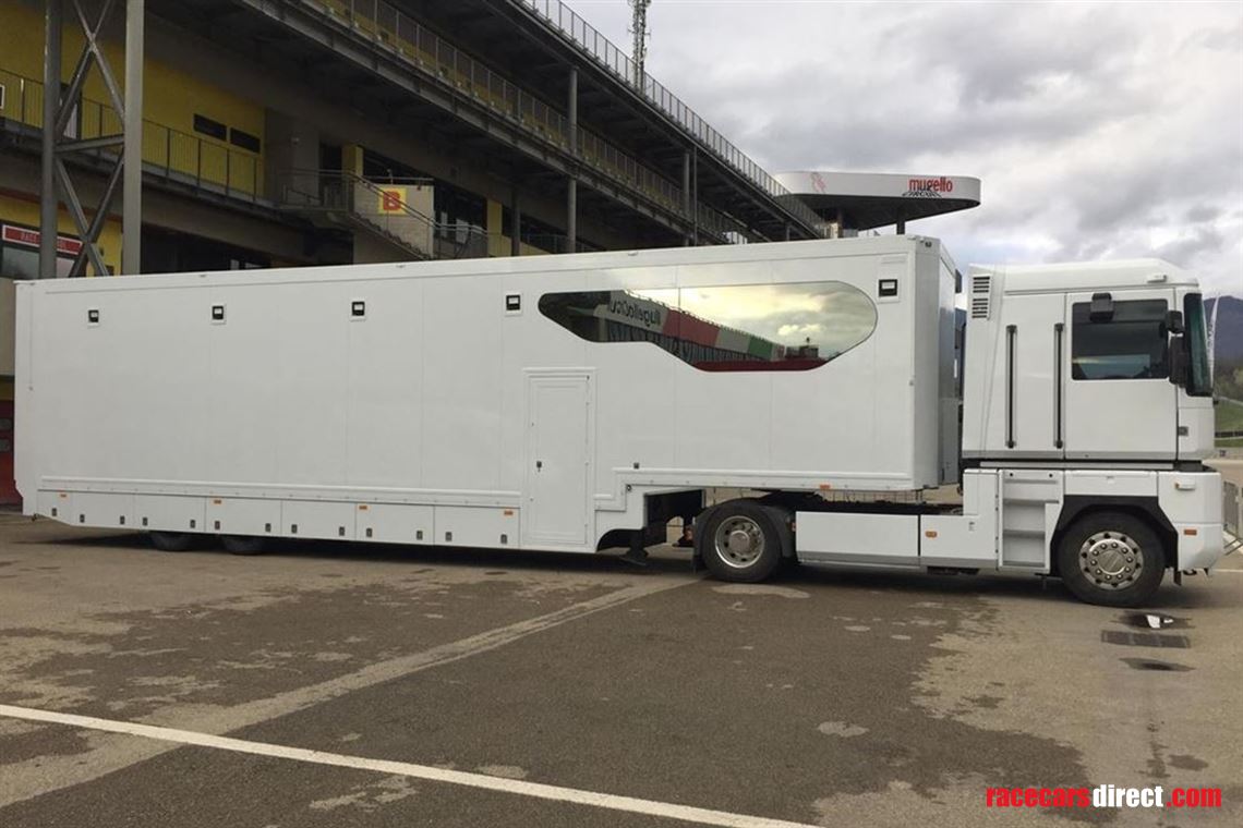 race-trailer-with-load-in-space-for-4-cars