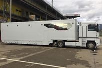 race-trailer-with-load-in-space-for-4-cars