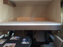 Front drop down double bed 