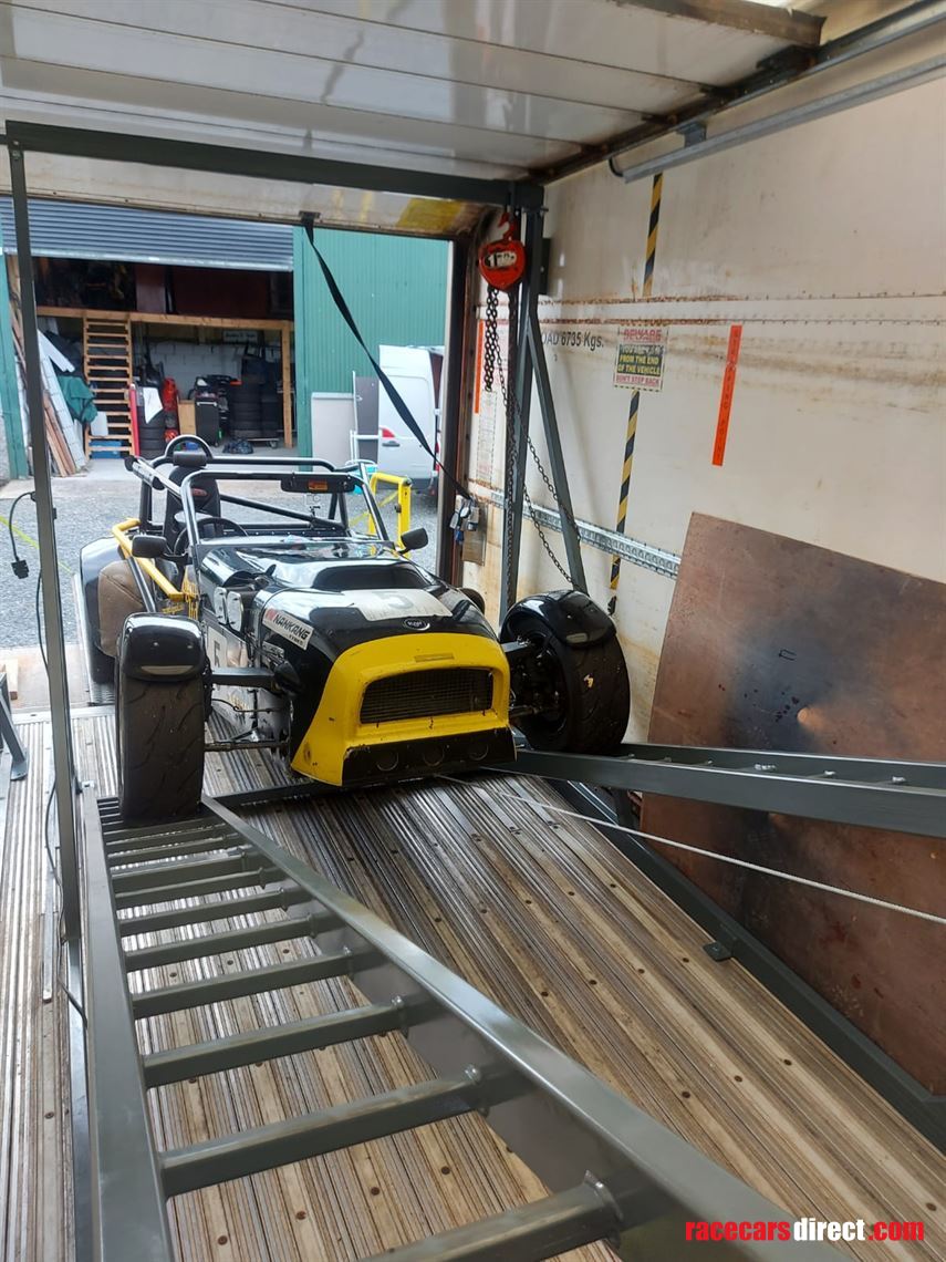 four-race-car-transporter-truck