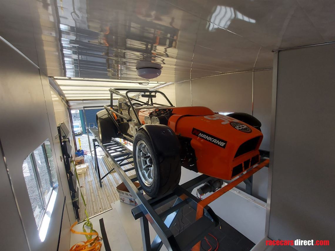 four-race-car-transporter-truck