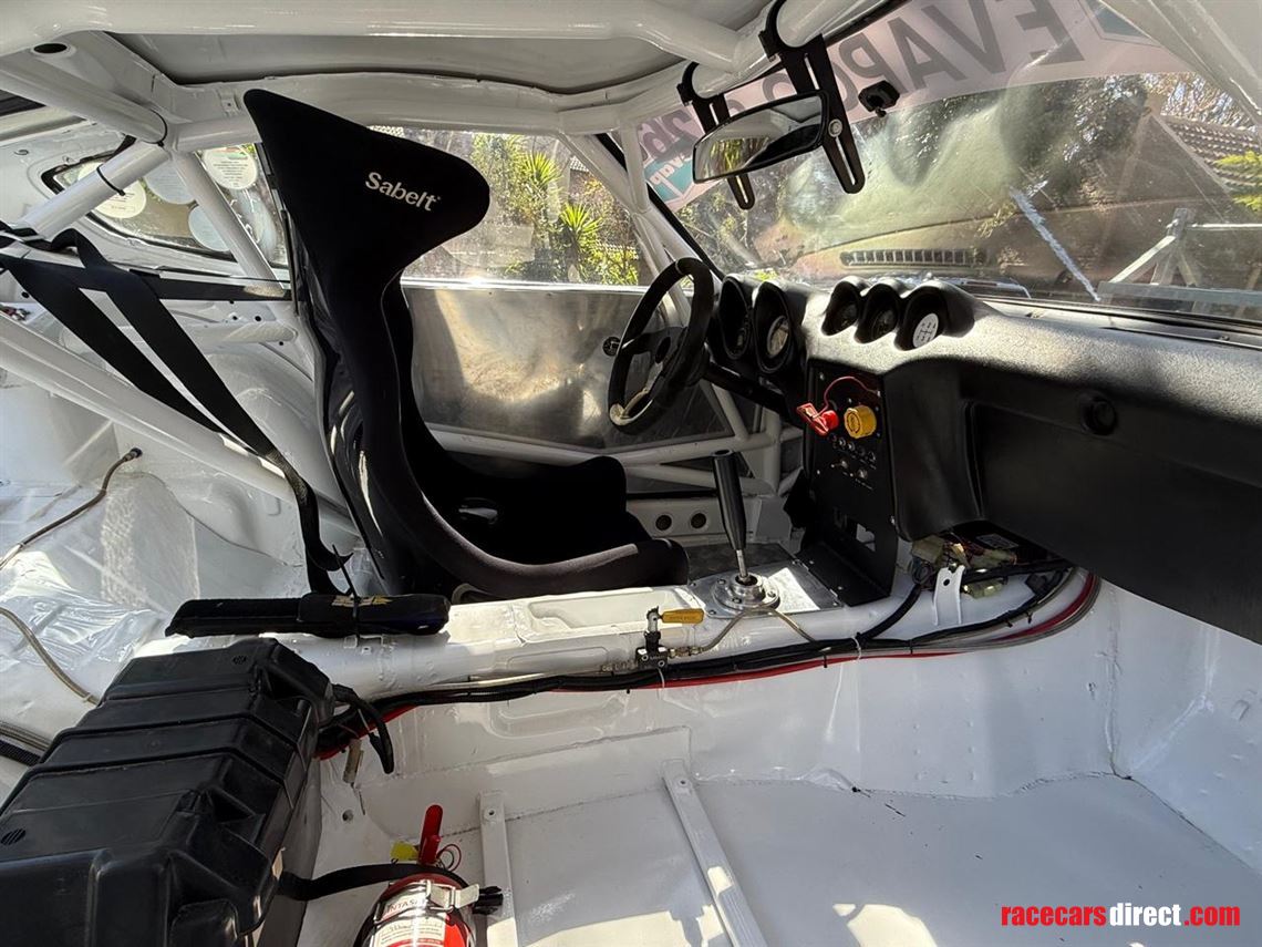 paul-newman-imsa-repica-datsun-260