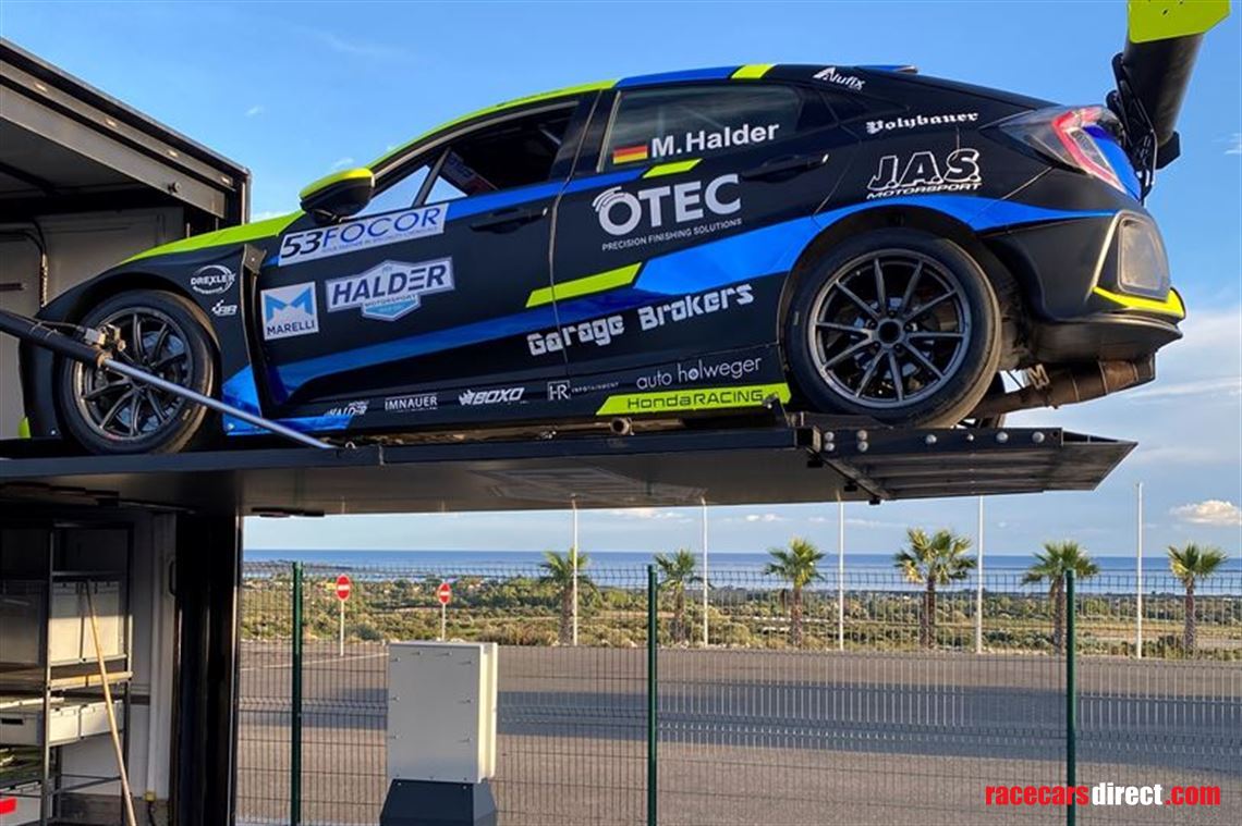 double-deck-racetrailer-with-daf-xf440-and-13