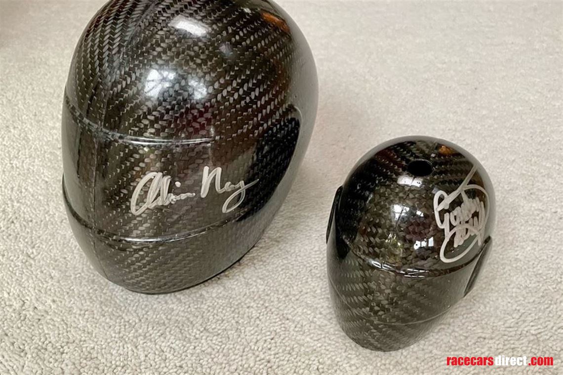 2x-carbon-wind-tunnel-model-helmets-signed-by