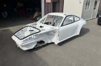 porscher-997-gt3-bare-chassis-with-roll-cage