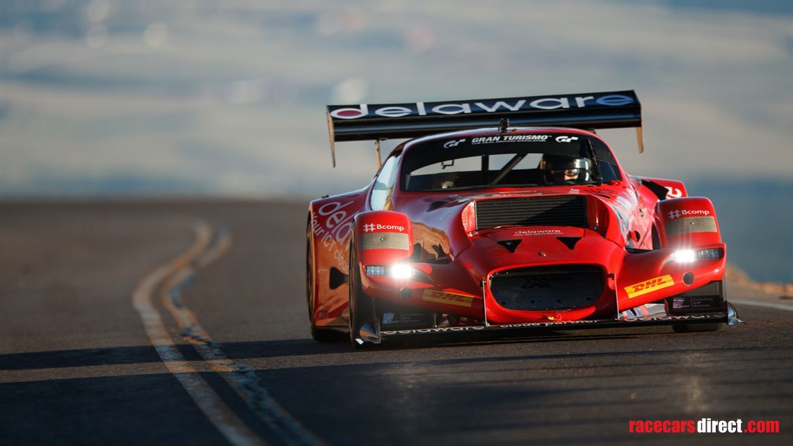 The Gillet Vertigo Pikes Peak in action during the legendary 2018 "Race to the Clouds". Driven by Vanina Ickx, this unique Belgian competition car contributed to a historic record and became part of Pikes Peak history.