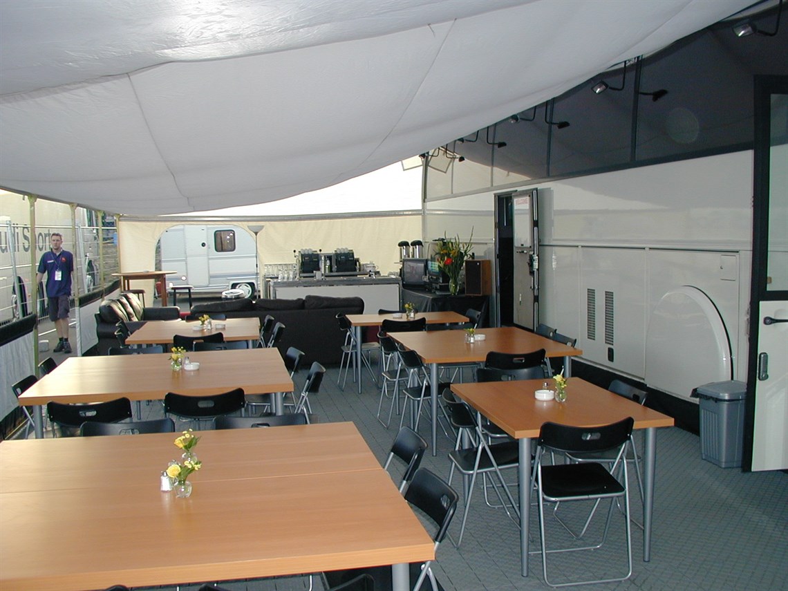 Main awning only. Tables and chairs and flooring sold by agreement.