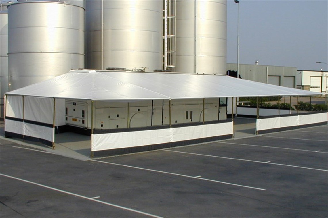 Main awning + 2 end extensions with half barriers. Full curtain walls also included.