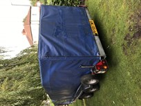 brian-james-minno-covered-trailer